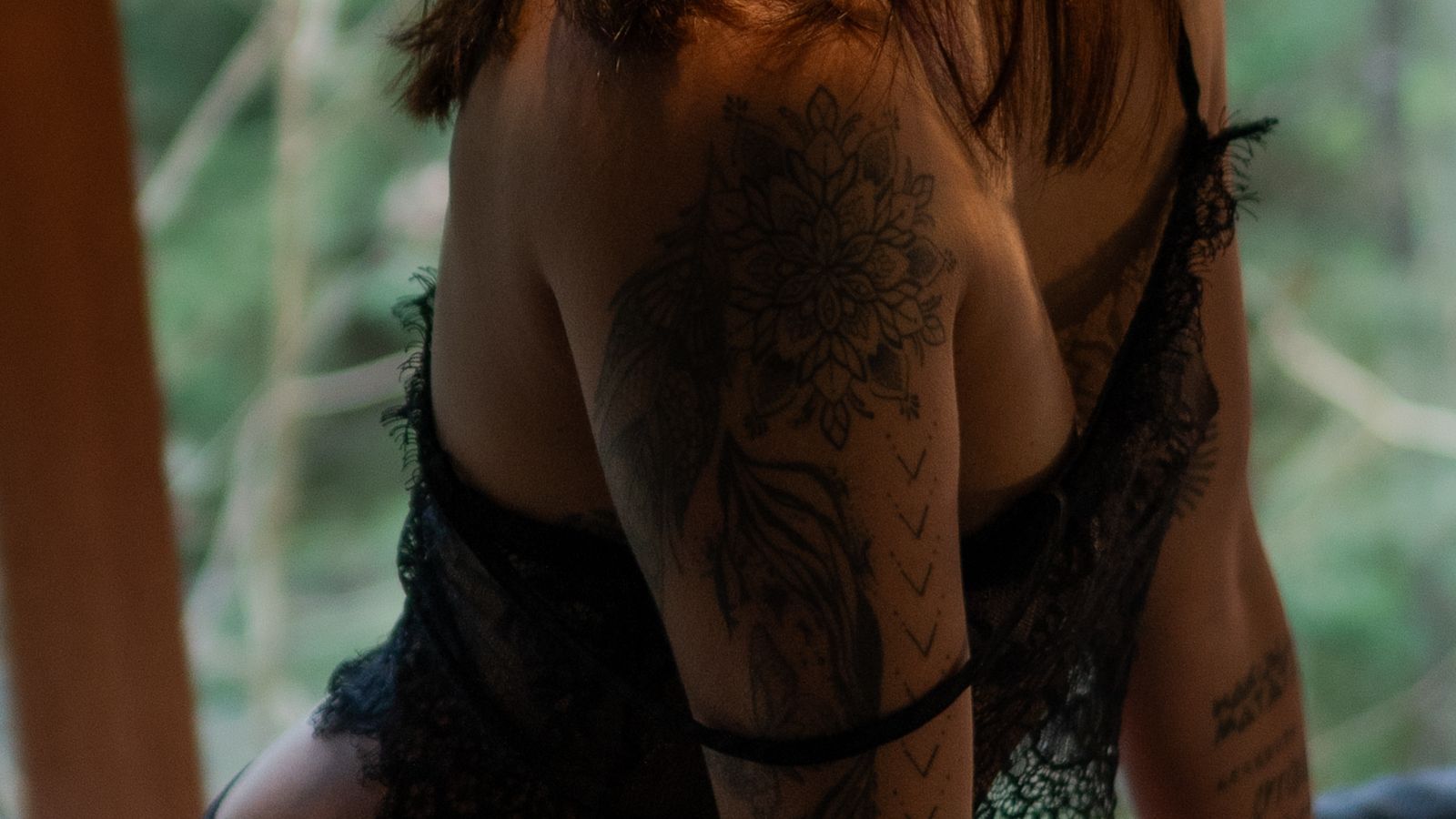 Close-up of a shoulder and collarbone in warm light